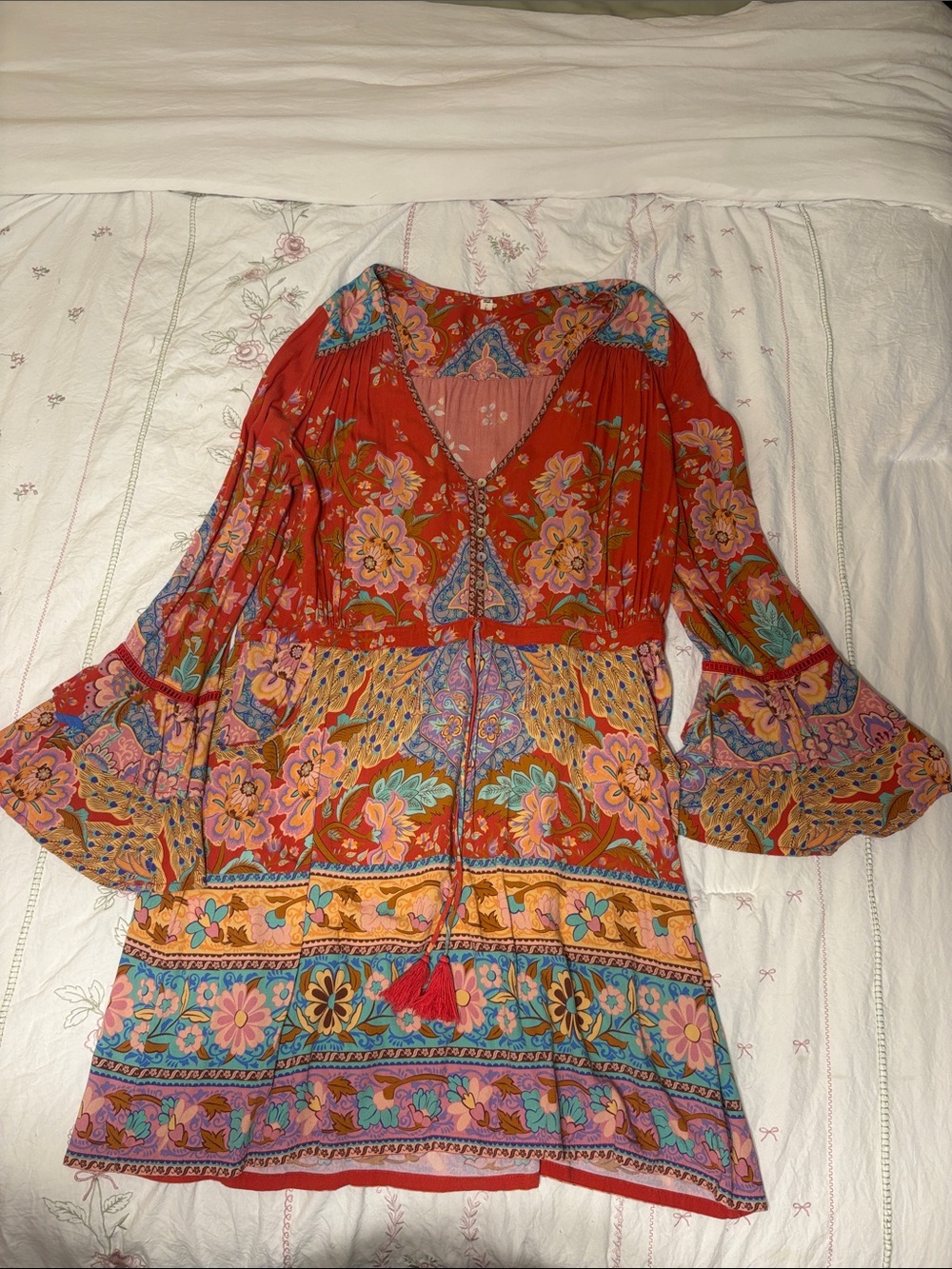 Bohemian Spell And The Gypsy Floral V-Neck Mini Dress.